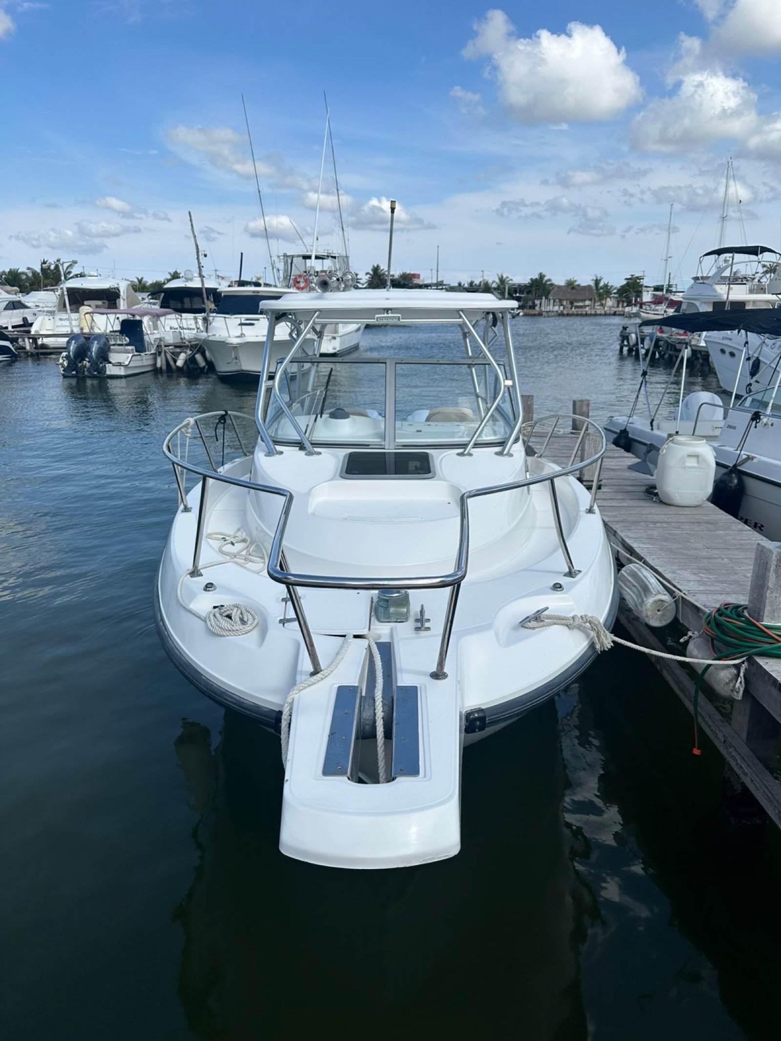 Boston Whaler 30 ft twin-outboard sport-fishing boat at Marina Yucalpetén ready for a charter out of Progreso Yucatán