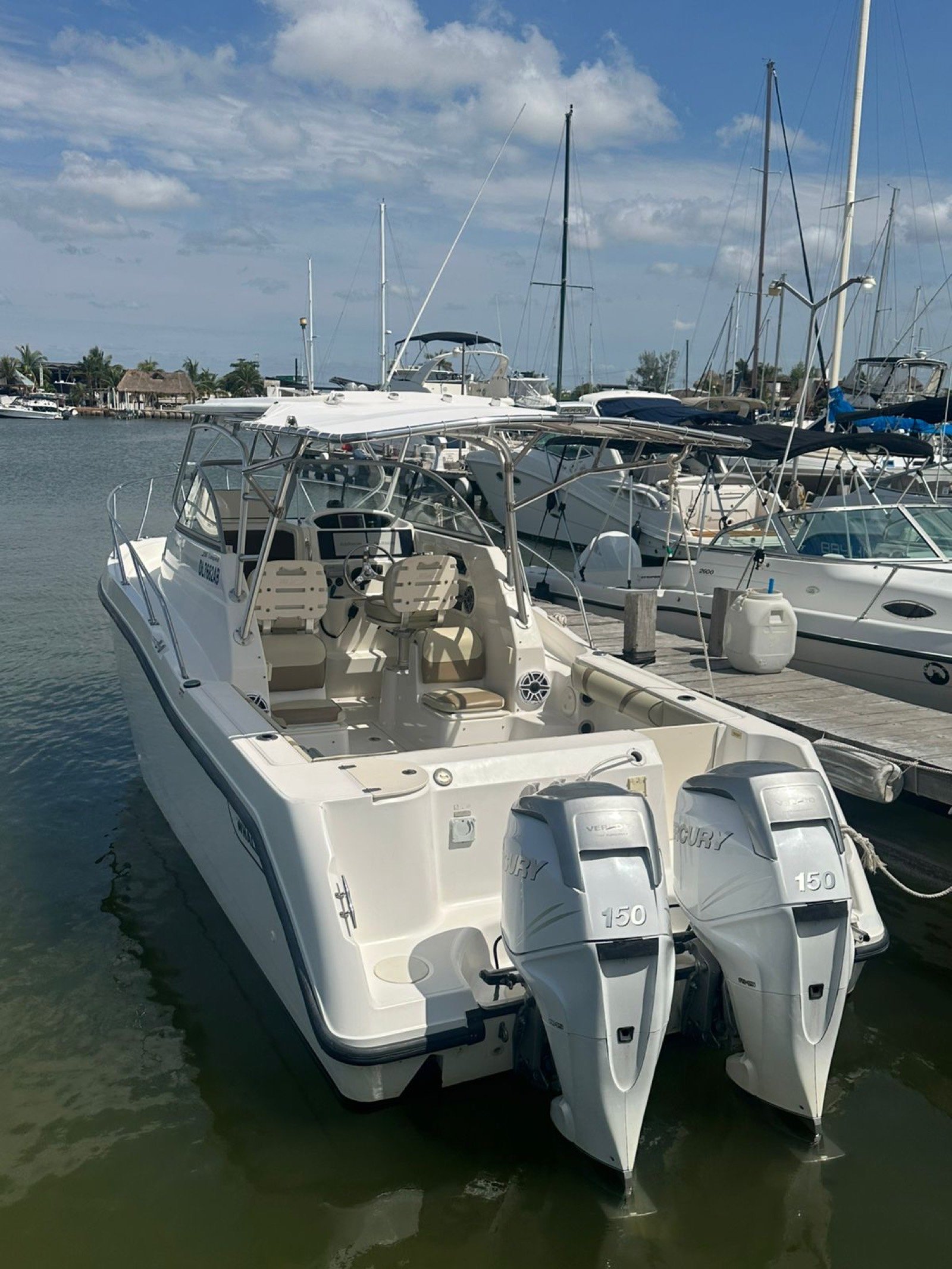 Boston Whaler 30 ft twin-outboard sport-fishing boat at Marina Yucalpetén ready for a charter out of Progreso Yucatán