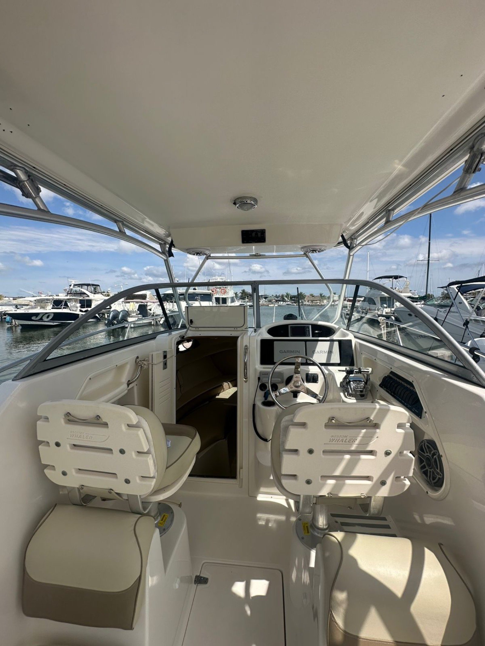 Boston Whaler 30 ft twin-outboard sport-fishing boat at Marina Yucalpetén ready for a charter out of Progreso Yucatán