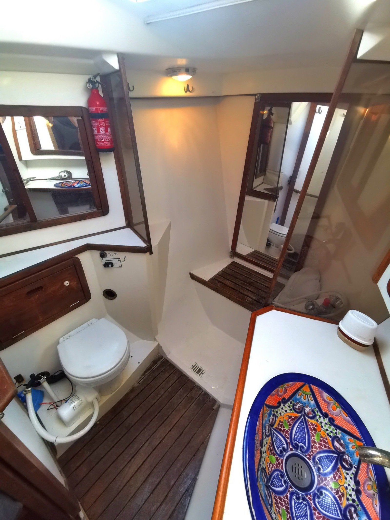 Catalina 42 ft sailing yacht with unfurled white sails off Marina Yucalpetén, Progreso Yucatán