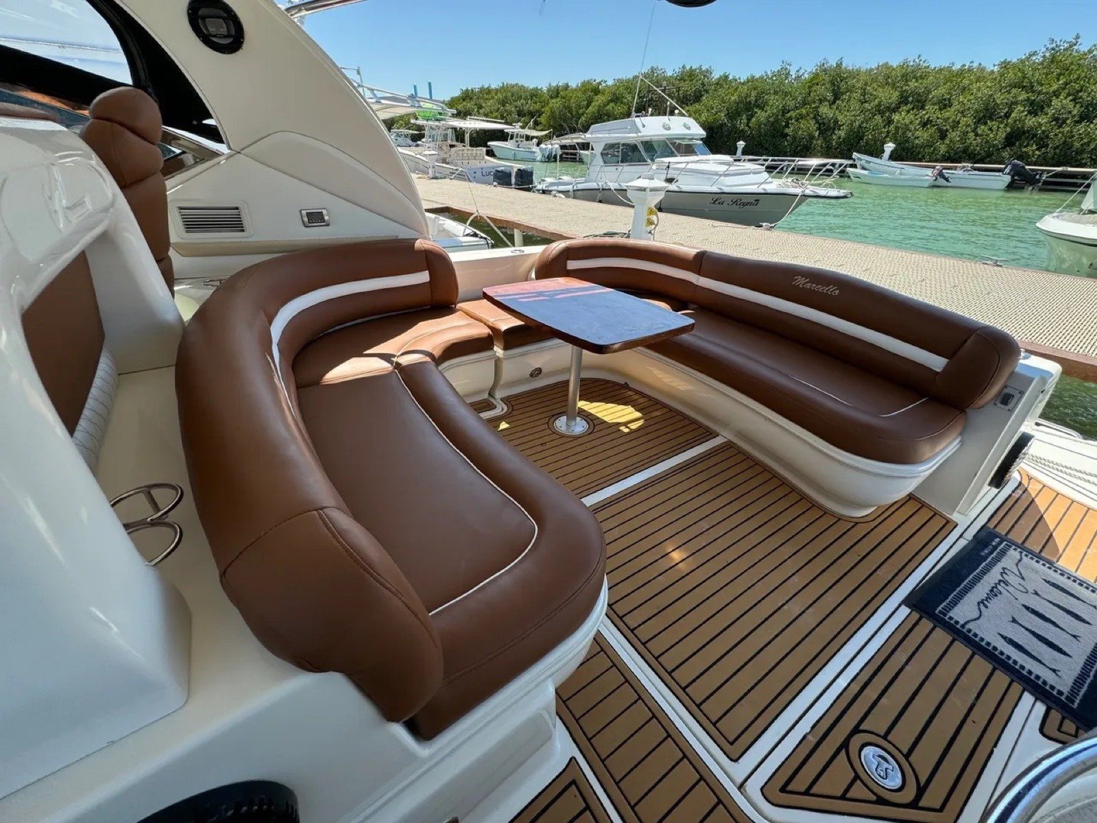 Sea Ray 46 ft Sundancer luxury motor yacht cruising off Progreso Yucatán with AC cabin and premium trim