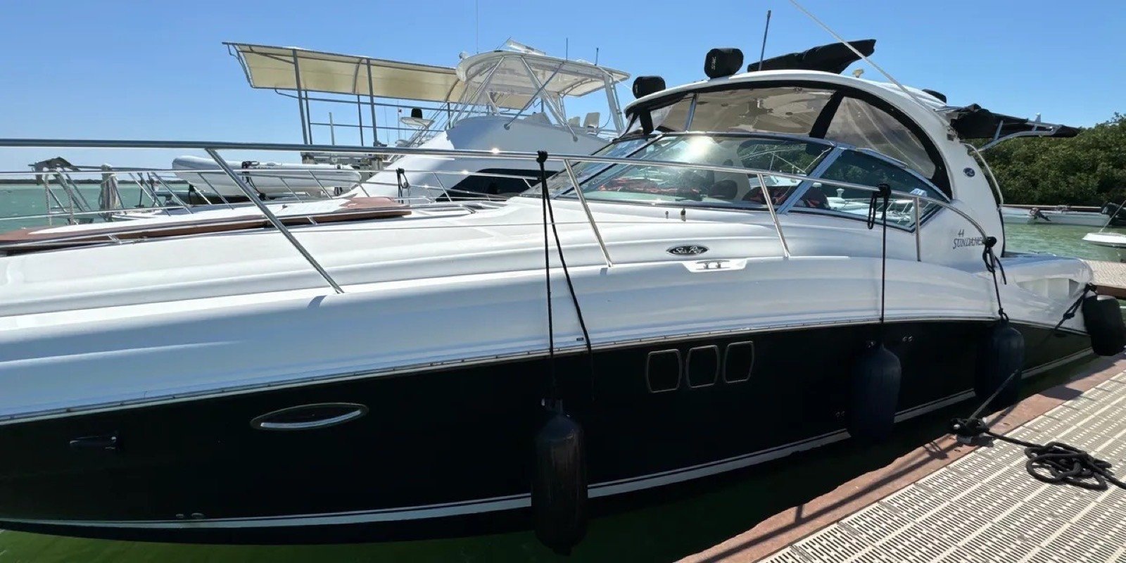 Sea Ray 46 ft Sundancer luxury motor yacht cruising off Progreso Yucatán with AC cabin and premium trim