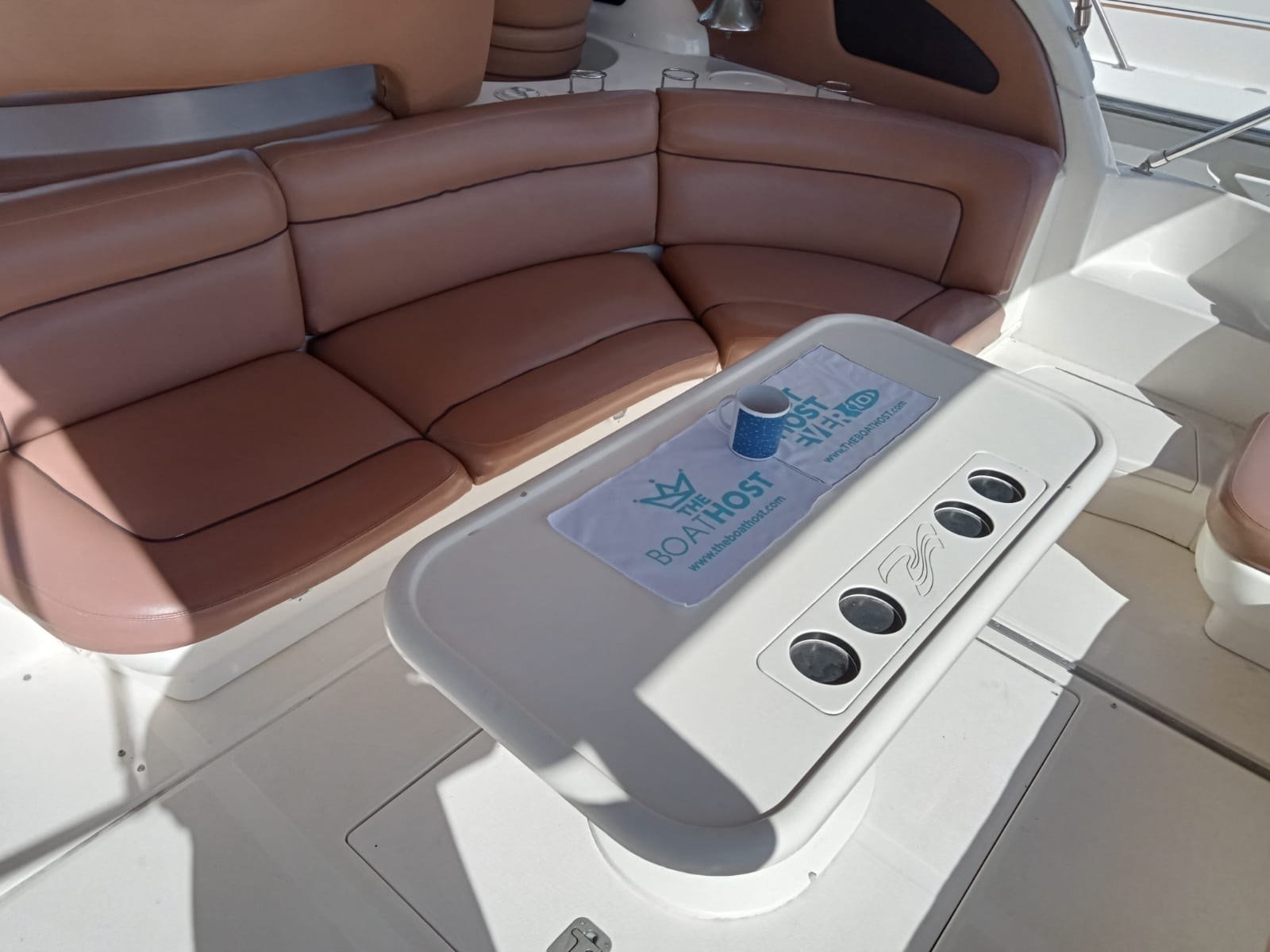 Sea Ray 48 ft Sundancer yacht with large swim platform anchored off Progreso Yucatán for a private charter