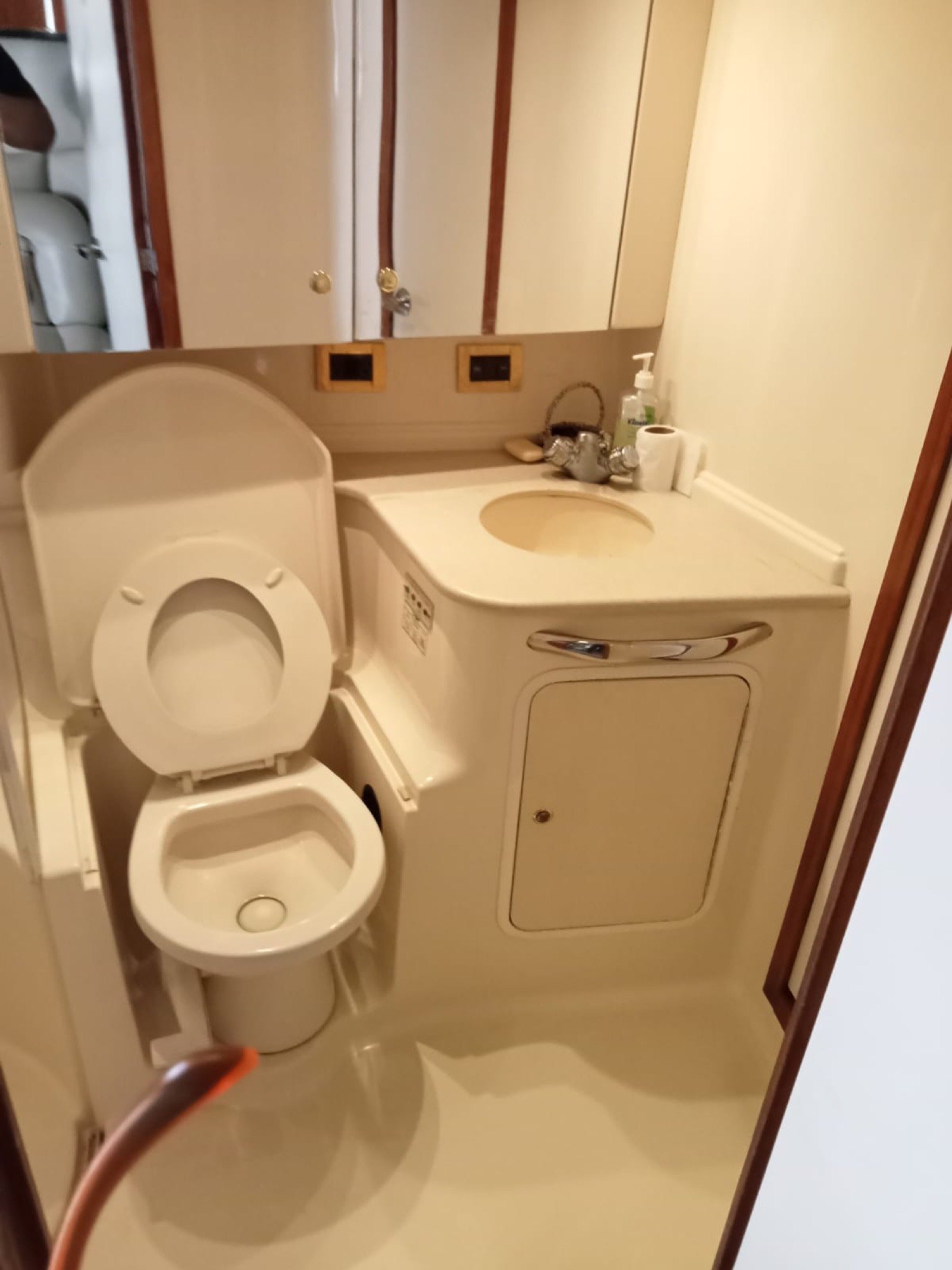 Sea Ray 48 ft Sundancer yacht with large swim platform anchored off Progreso Yucatán for a private charter