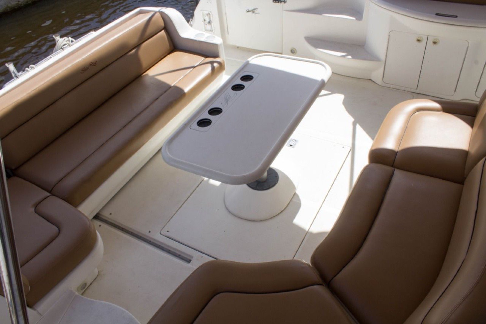 Sea Ray 48 ft Sundancer yacht with large swim platform anchored off Progreso Yucatán for a private charter