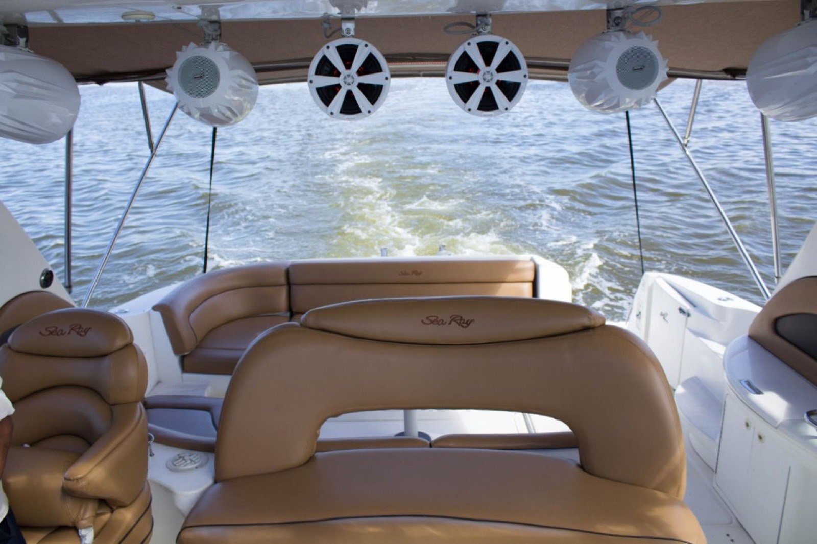 Sea Ray 48 ft Sundancer yacht with large swim platform anchored off Progreso Yucatán for a private charter