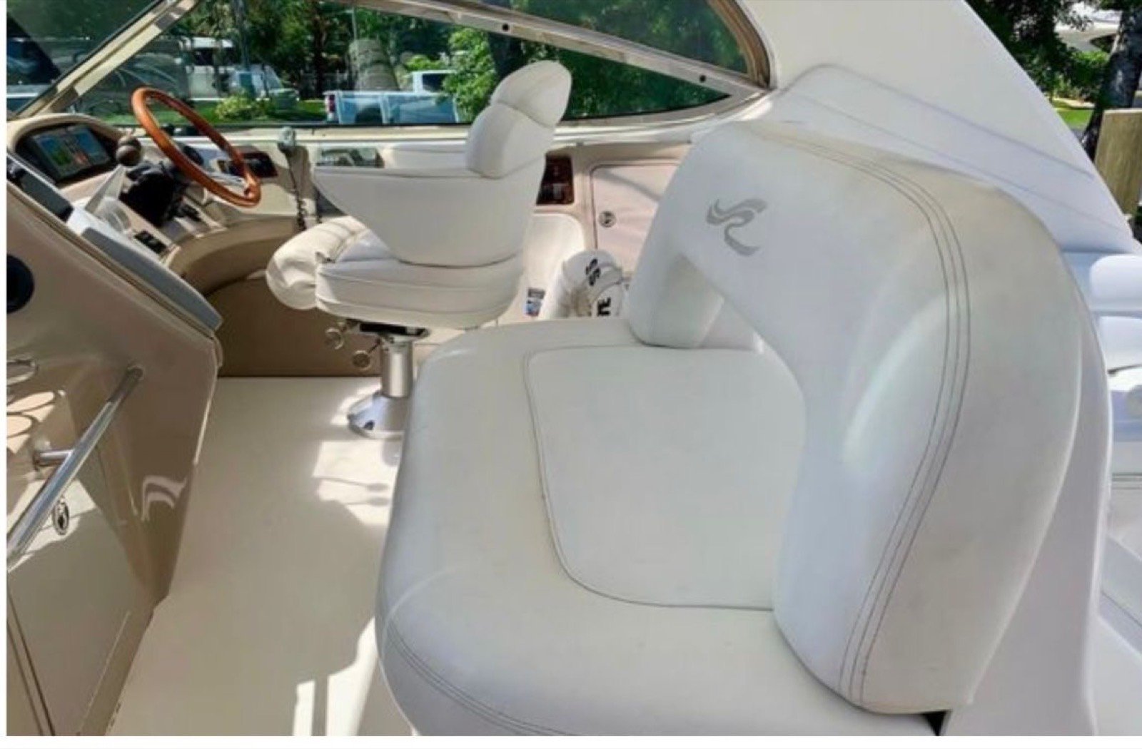 Sea Ray Sundancer 60 ft luxury motor yacht with master cabin and crew of 3 cruising off Progreso Yucatán