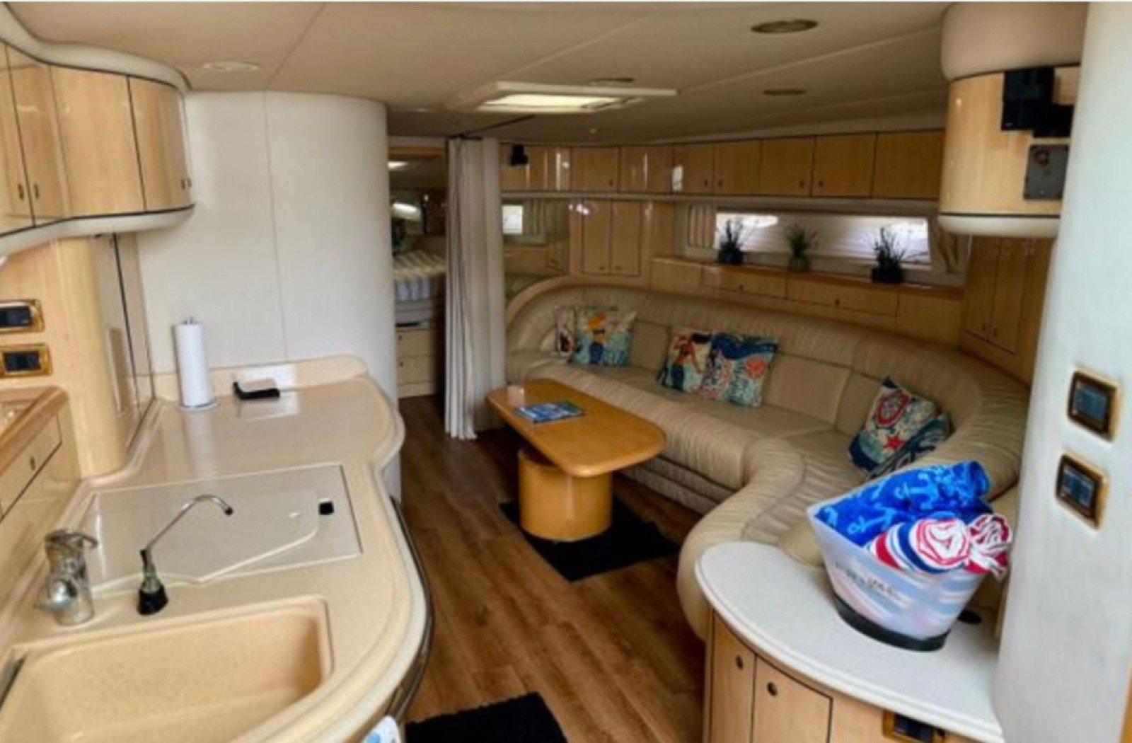 Sea Ray Sundancer 60 ft luxury motor yacht with master cabin and crew of 3 cruising off Progreso Yucatán