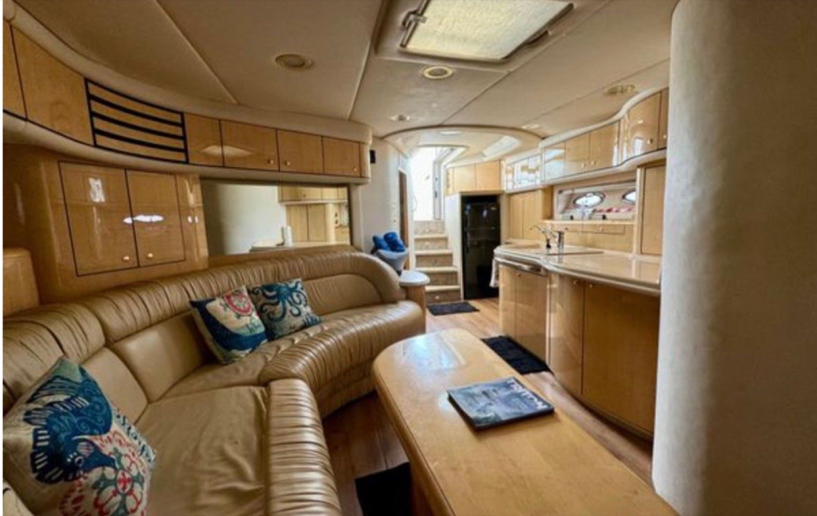 Sea Ray Sundancer 60 ft luxury motor yacht with master cabin and crew of 3 cruising off Progreso Yucatán