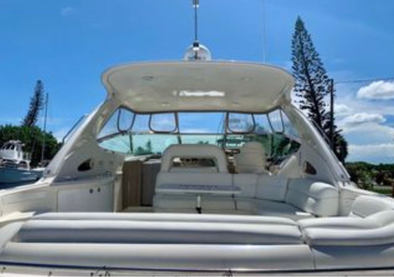 Sea Ray Sundancer 60 ft luxury motor yacht with master cabin and crew of 3 cruising off Progreso Yucatán