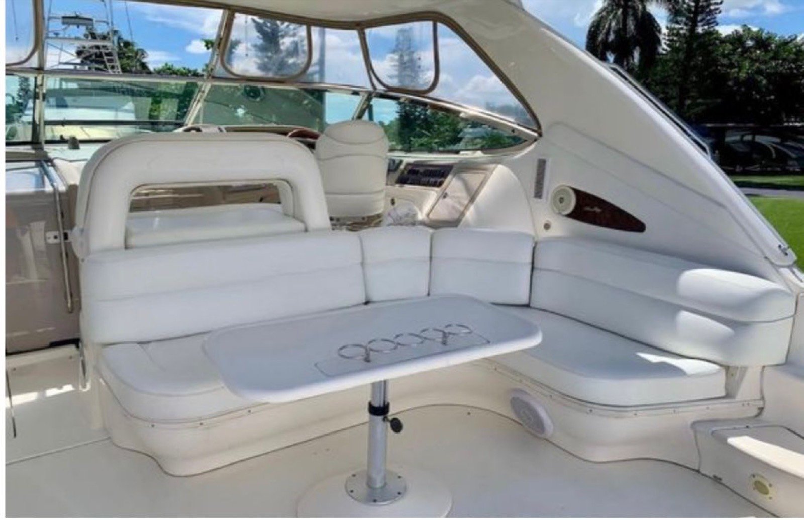 Sea Ray Sundancer 60 ft luxury motor yacht with master cabin and crew of 3 cruising off Progreso Yucatán