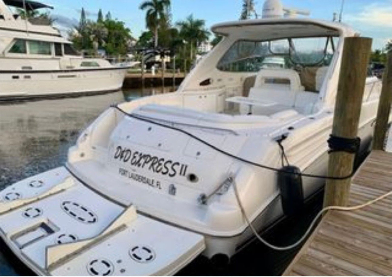 Sea Ray Sundancer 60 ft luxury motor yacht with master cabin and crew of 3 cruising off Progreso Yucatán