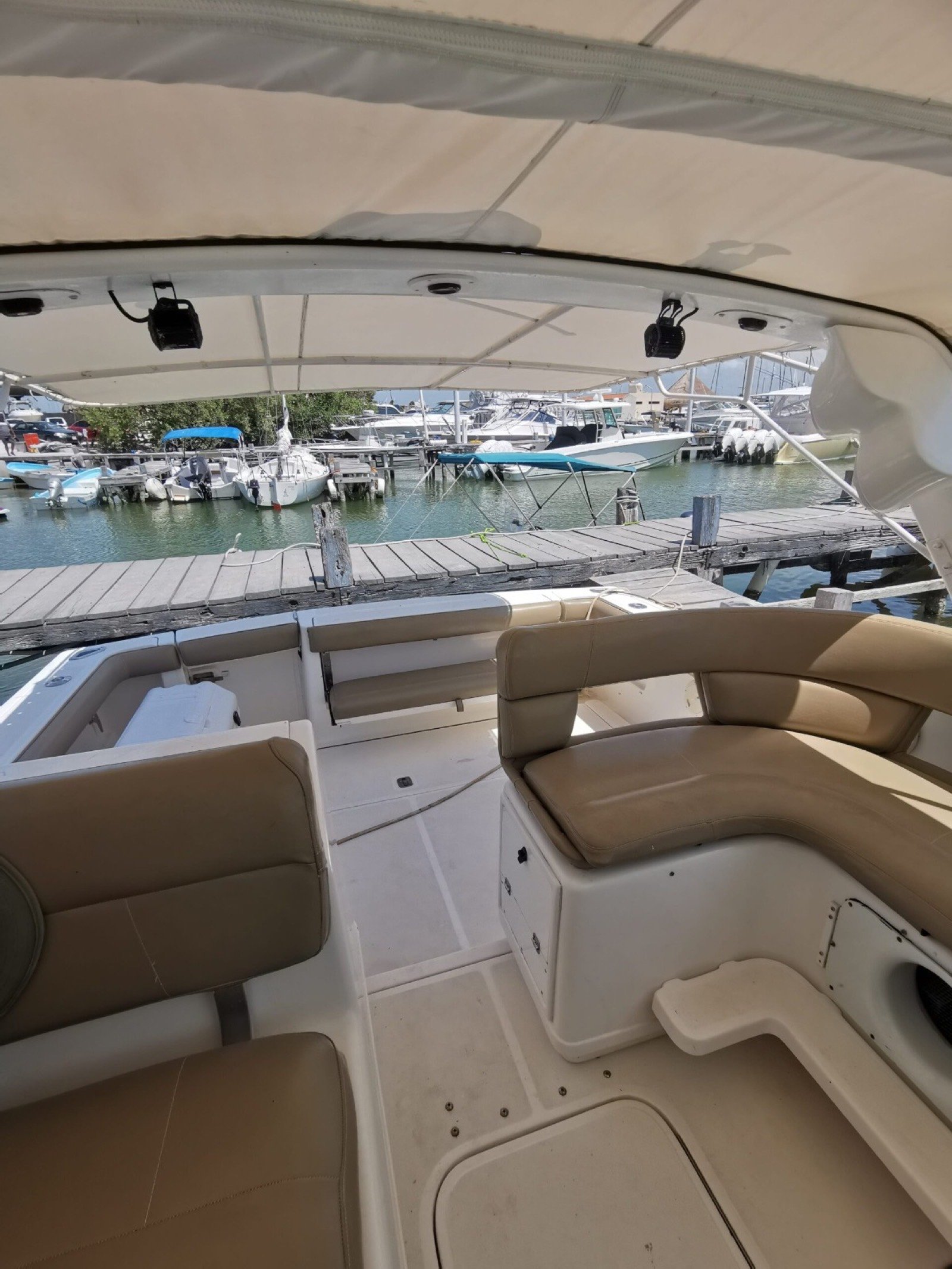 Tiara 34 ft convertible motor yacht docked at Marina Yucalpetén in Progreso Yucatán